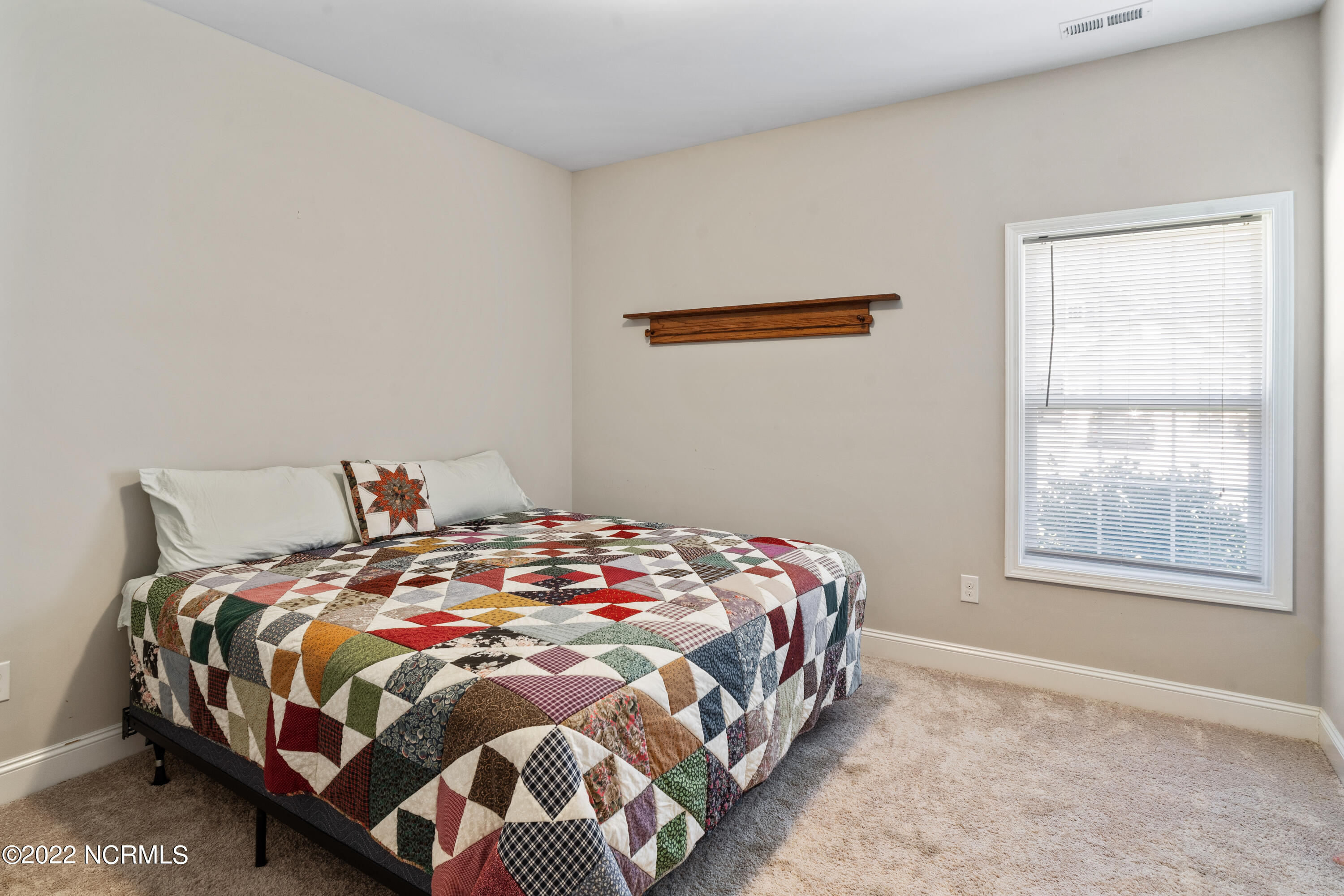 1801 Wildwood Court Southwest Ocean Isle Beach, NC 28469 - Photo 11 of 34 Guest Bedroom