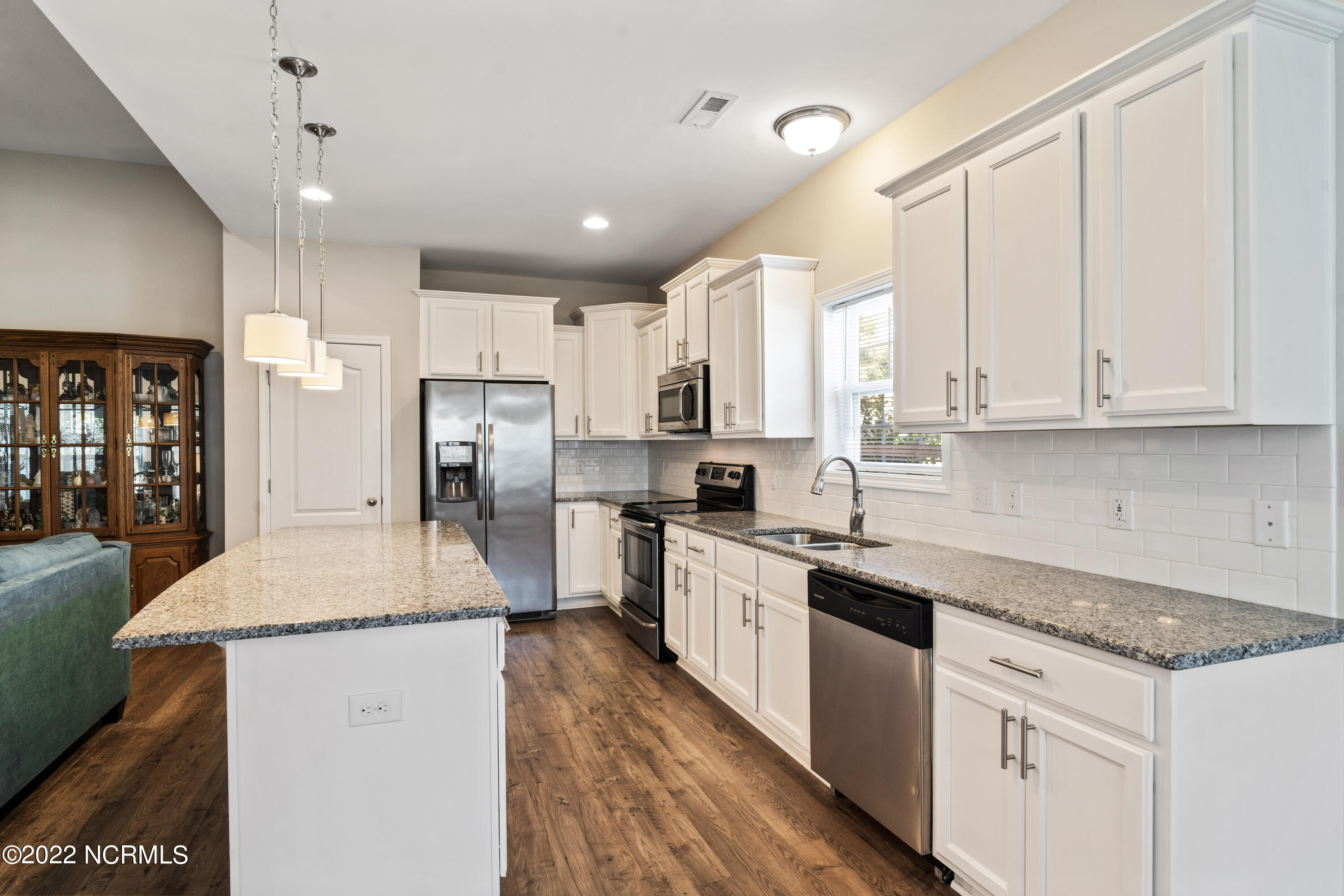 1801 Wildwood Court Southwest Ocean Isle Beach, NC 28469 - Photo 19 of 34 Kitchen Island