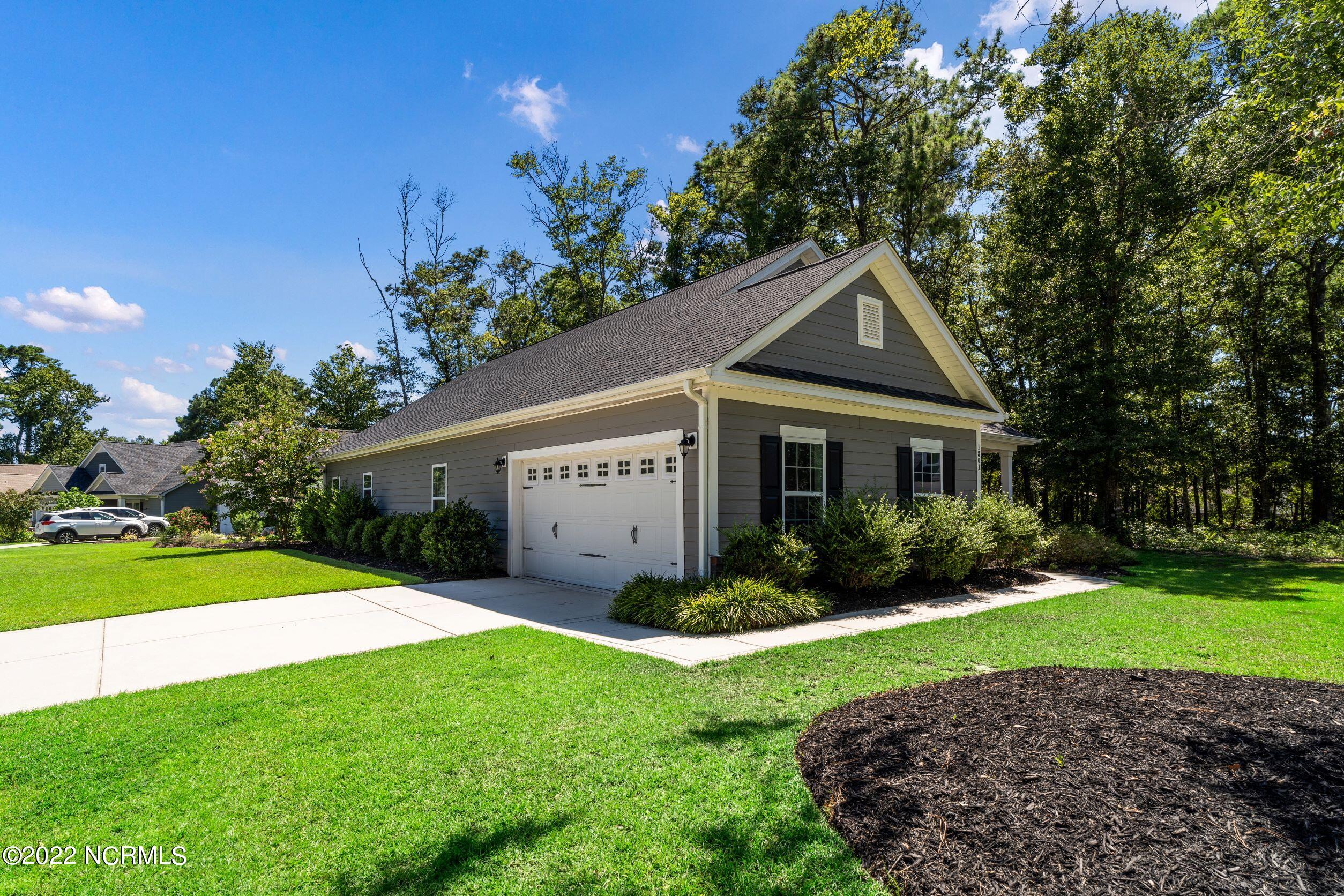 1801 Wildwood Court Southwest Ocean Isle Beach, NC 28469 - Photo 2 of 34 2 Car Garage
