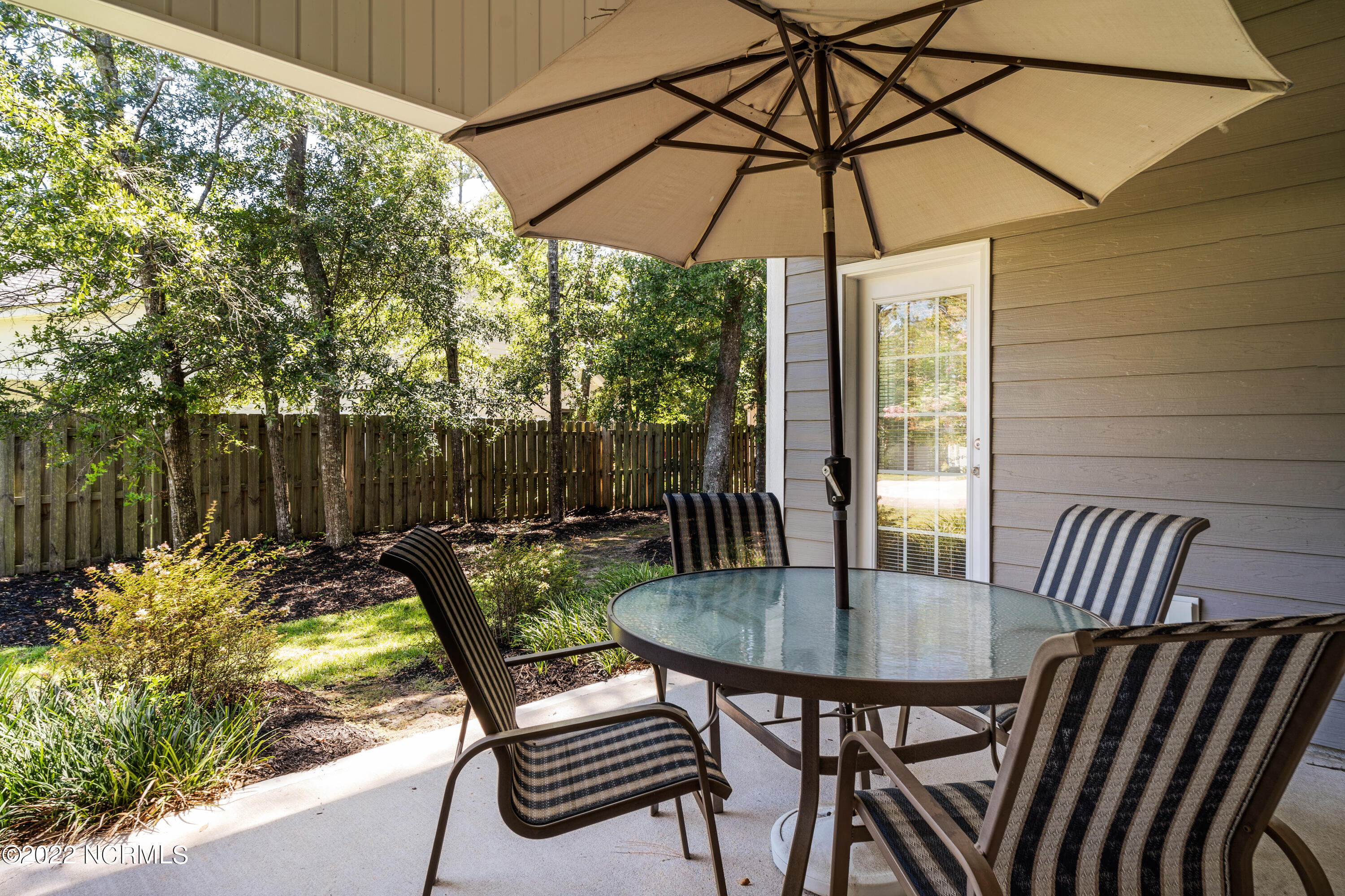 1801 Wildwood Court Southwest Ocean Isle Beach, NC 28469 - Photo 4 of 34 Back Porch Sitting Area