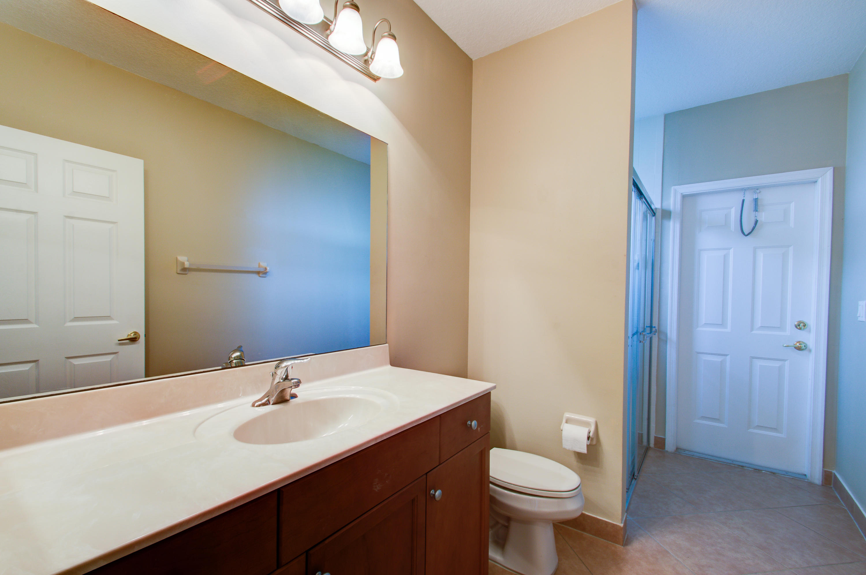 9804 Stover Way Wellington, FL 33414 - Photo 12 of 27 Bathroom off Family Room