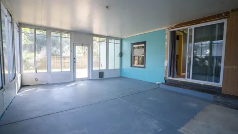 an empty room with windows