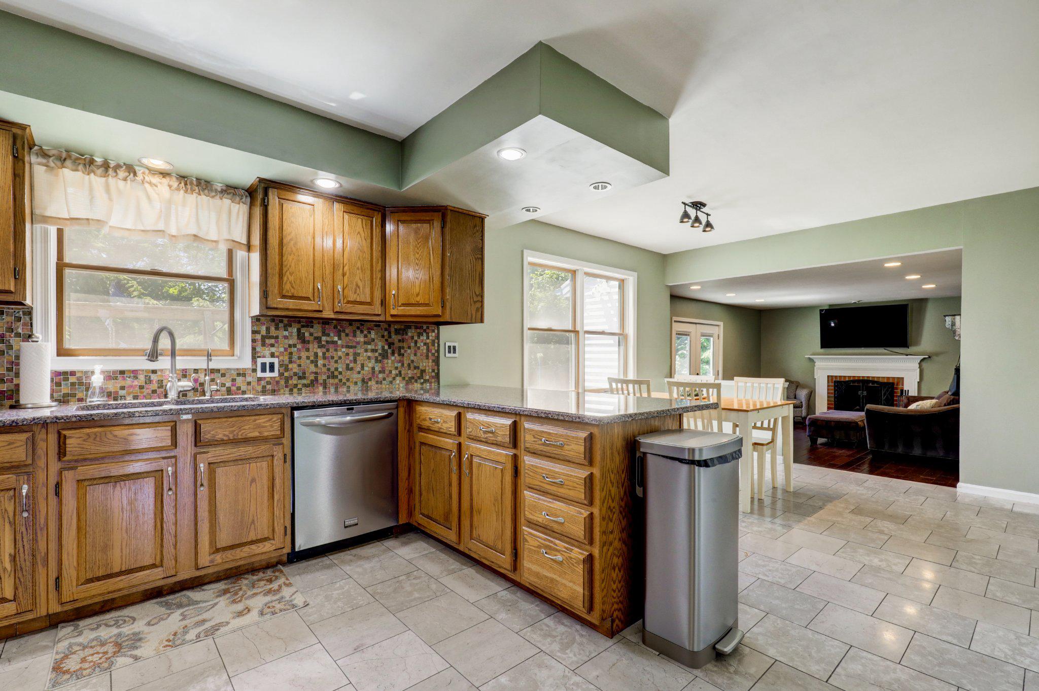 2 Mockingbird Drive Denver, PA 17517 - Photo 14 of 39 Modern kitchen with warm wood accents.