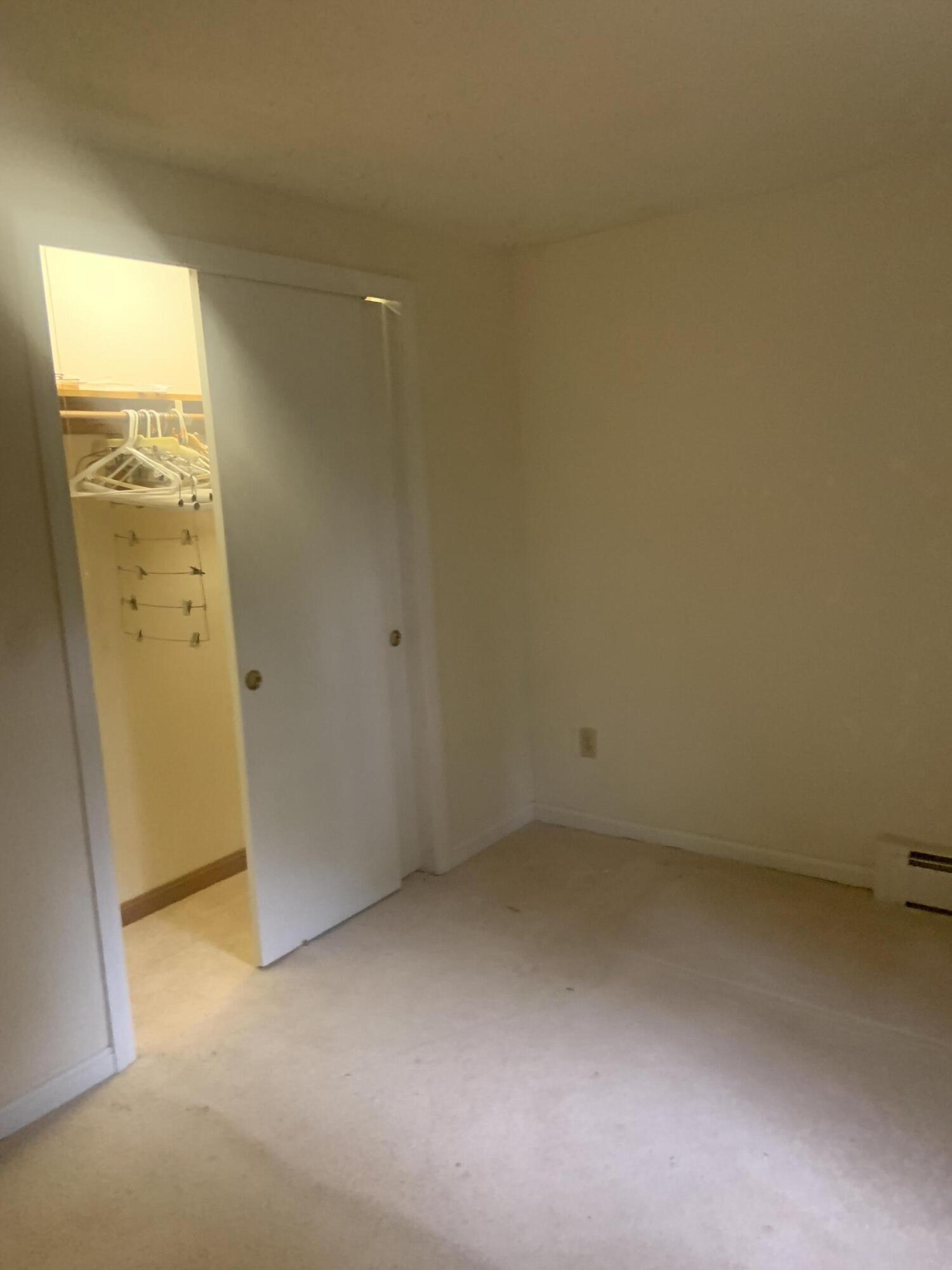 121 Longfellow Drive Centerville, MA 02632 - Photo 9 of 15 an empty room with windows