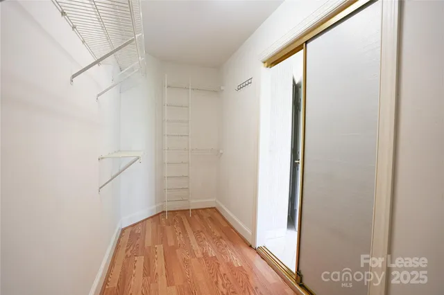 a view of small space with racks on the wall