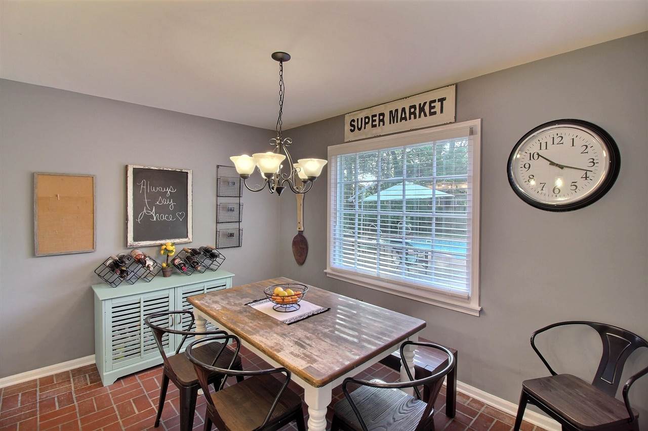 431 King Ridge Drive Collierville, TN 38017 - Photo 11 of 25 a view of a dining room with furniture window and wooden floor
