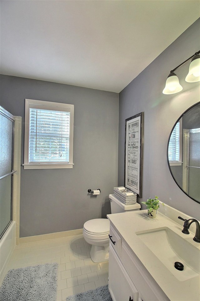 431 King Ridge Drive Collierville, TN 38017 - Photo 19 of 25 a bathroom with a sink mirror and toilet