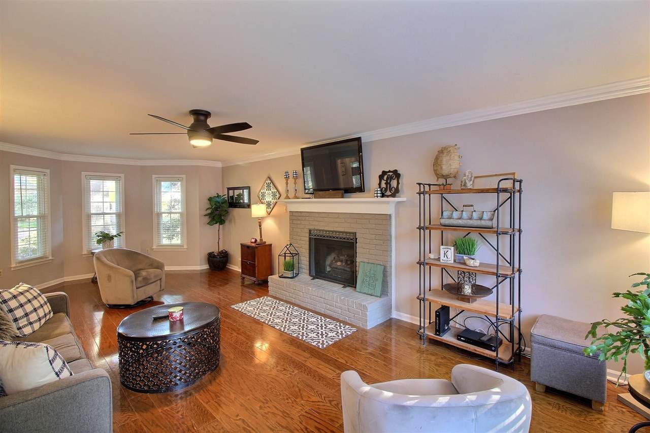 431 King Ridge Drive Collierville, TN 38017 - Photo 6 of 25 a living room with furniture and a fireplace