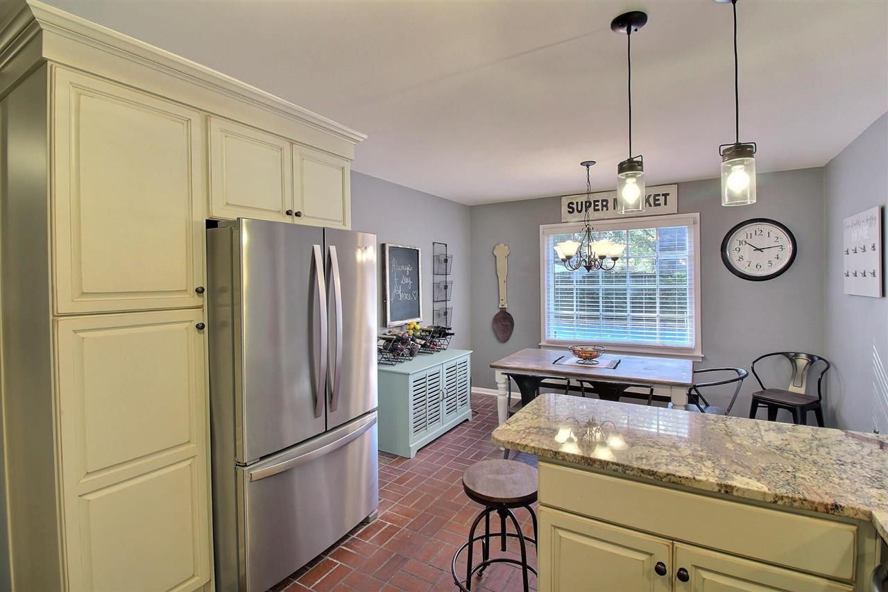 431 King Ridge Drive Collierville, TN 38017 - Photo 10 of 25 a kitchen with refrigerator and cabinets