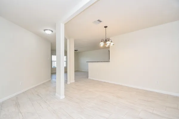 a view of an empty room with window