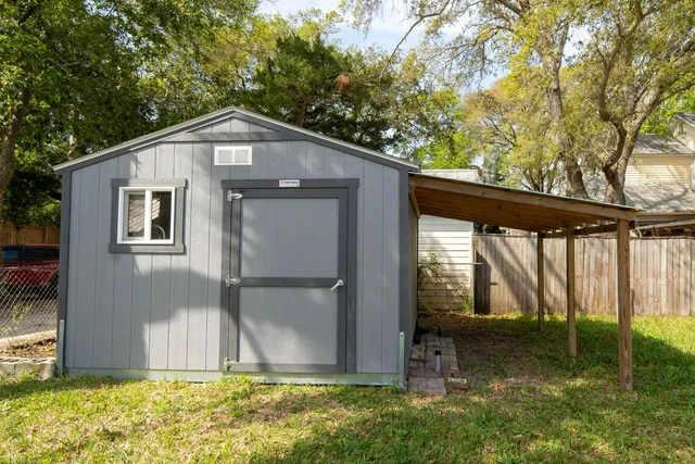 a backyard of a house with lots of green space
