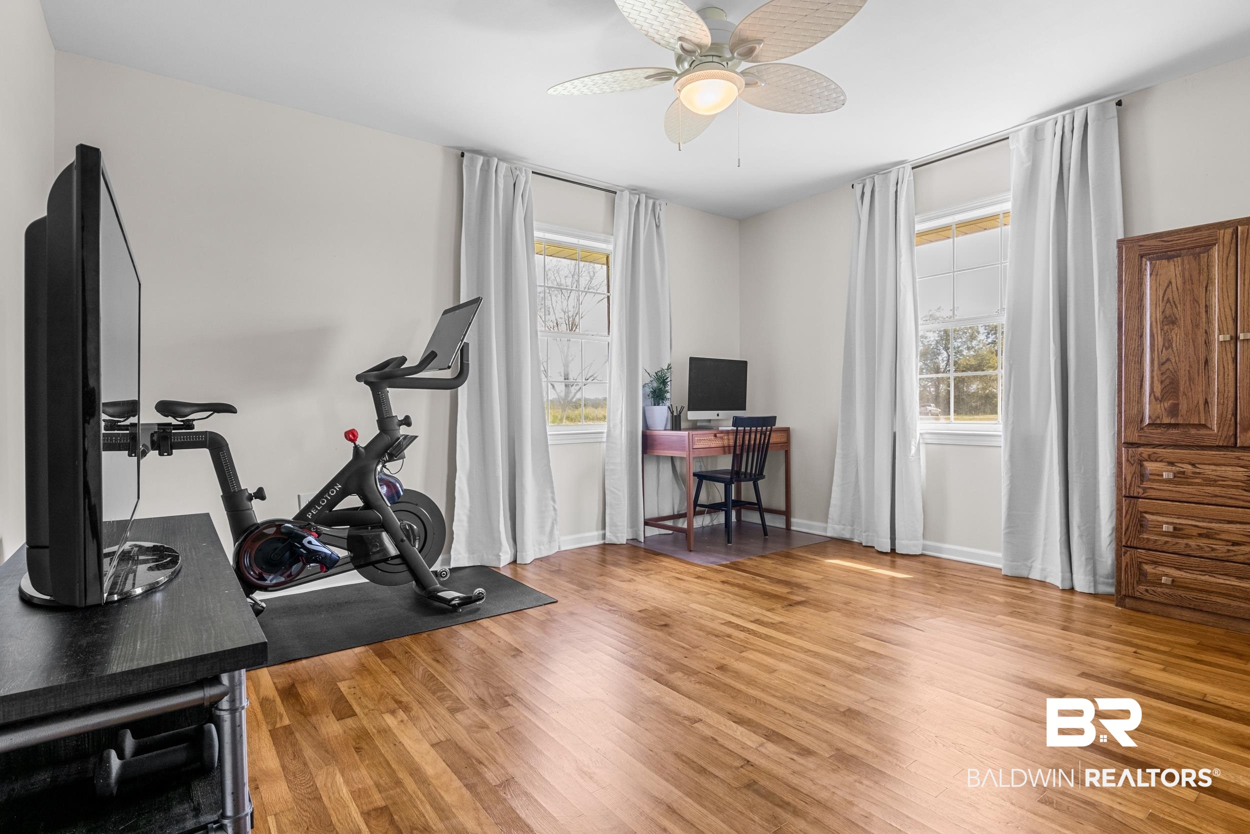 17689 Brewer Road Foley, AL 36535 - Photo 35 of 54 Workout room with wood-type flooring and ceiling fan