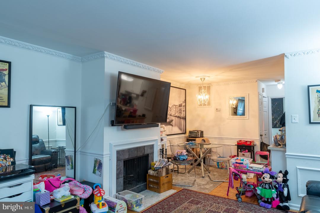 4230 River Road Northwest Washington, DC 20016 - Photo 6 of 11 Sample- LR with Wood burning fireplace