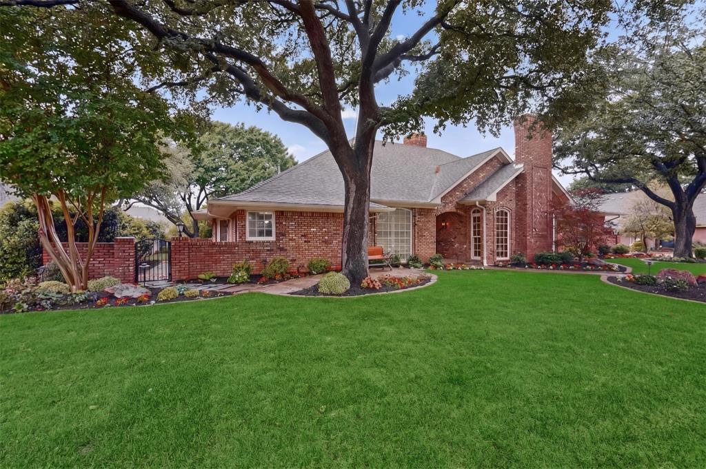 2405 Wing Point Lane Plano, TX 75093 - Photo 3 of 39 a view of a house with a yard