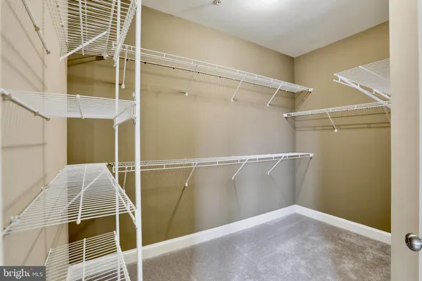 a view of empty room with windows