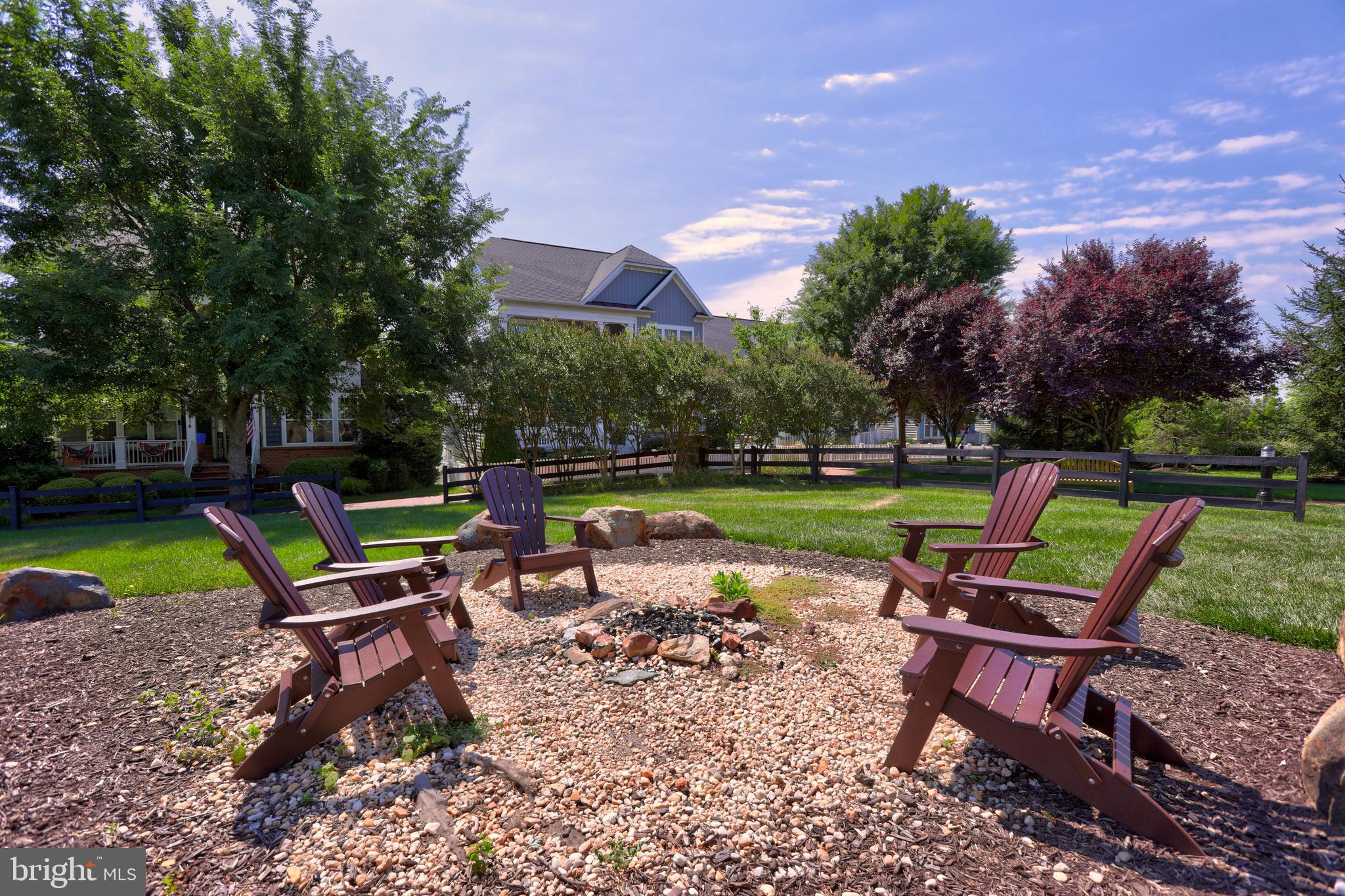 1414 Musgrove Alley Brunswick, MD 21716 - Photo 54 of 64 a view of a chairs in a backyard