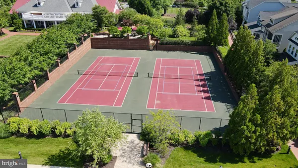 an aerial view of a house with a garden
