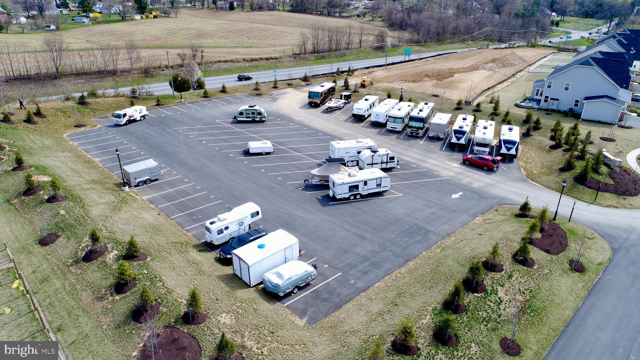 1414 Musgrove Alley Brunswick, MD 21716 - Photo 62 of 64 an aerial view of a yard with table and chairs