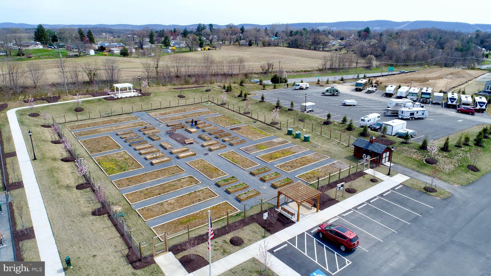 1414 Musgrove Alley Brunswick, MD 21716 - Photo 64 of 64 an aerial view of a house with a garden