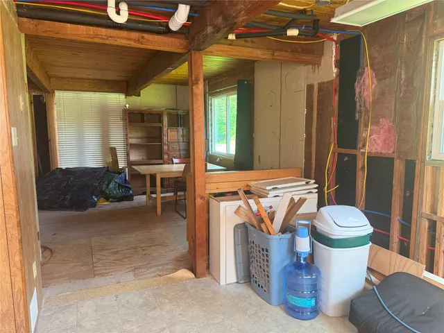 a bathroom with a sink and a washing machine