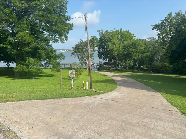 a view of a lake with a terrace