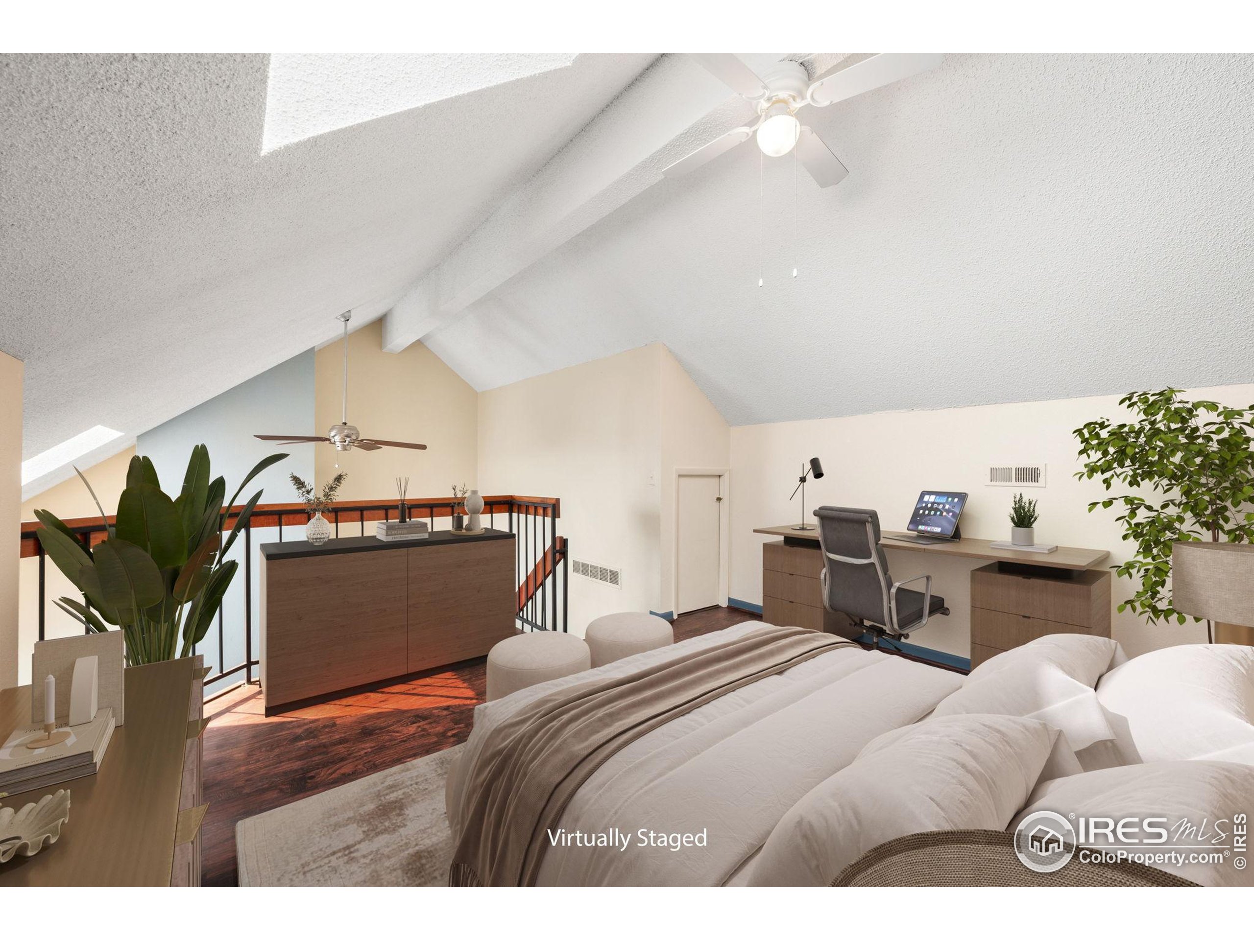 5914 Gunbarrel Avenue, Unit F Boulder, CO 80301 - Photo 15 of 25 a bedroom with furniture and a mirror