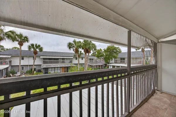 a bathroom with a sink vanity granite and mirror