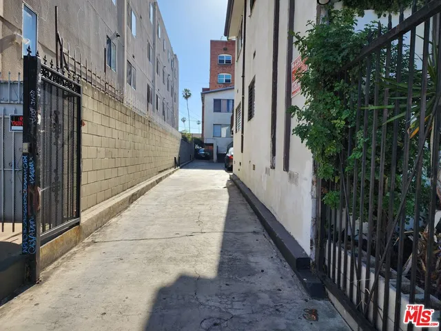 a view of a pathway both side of building