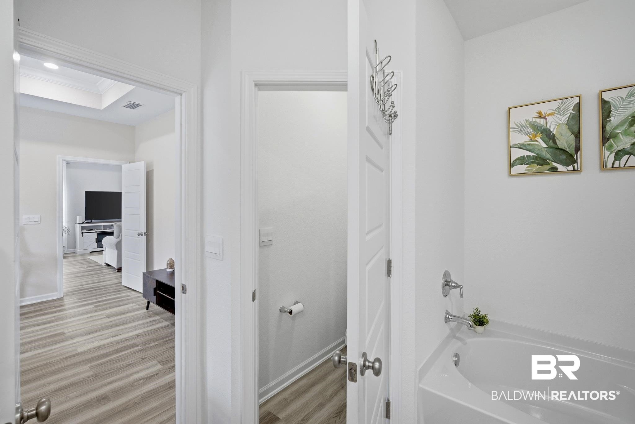 13887 Antler Hl Road Daphne, AL 36527 - Photo 21 of 50 Full bathroom featuring a bath, light wood finished floors, and crown molding