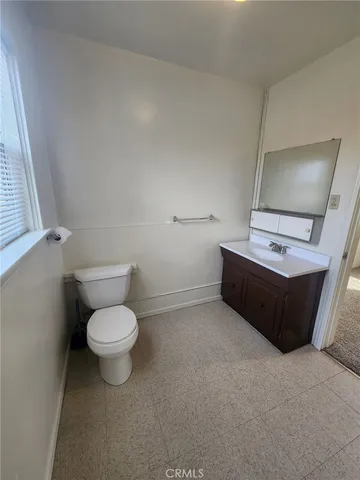 a view of a house with a snow in the yard