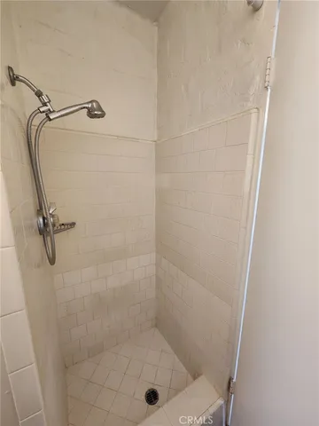 a bathroom with a sink toilet and mirror