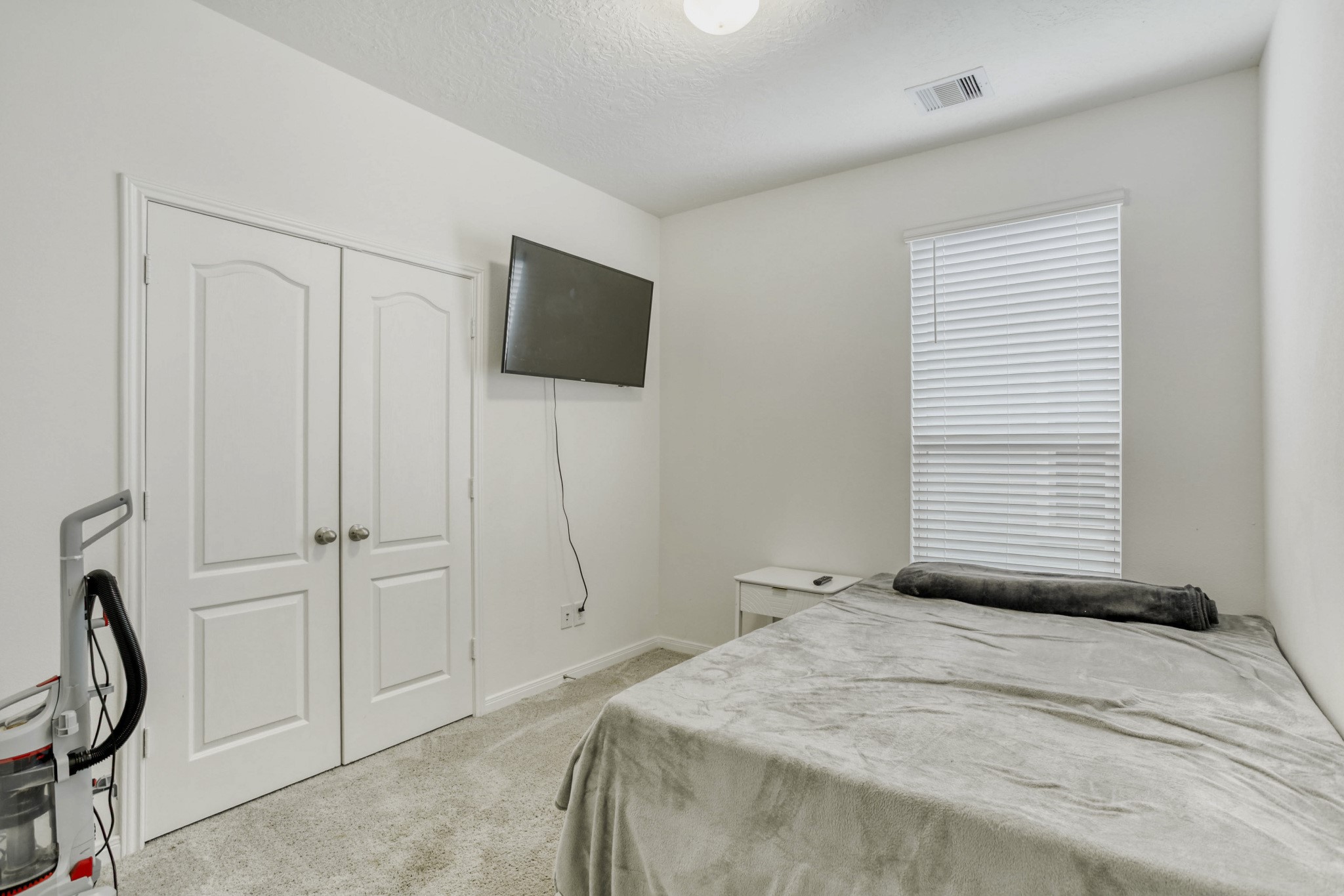 3331 Forest Chitto Dr Spring Spring, TX 77373 - Photo 23 of 29 Bedroom 3 is cozy and features neutral walls with a double door spacious closet.