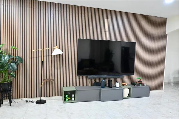 a living room with a flat screen tv