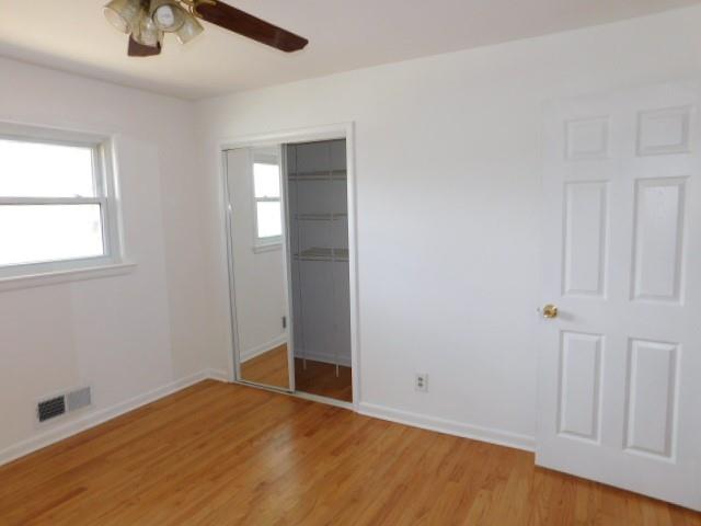 2407 Summerland Drive Decatur, GA 30032 - Photo 16 of 22 an empty room with windows and closet