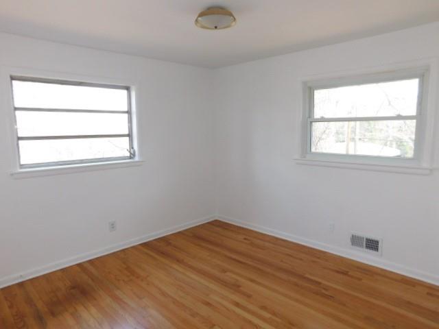 2407 Summerland Drive Decatur, GA 30032 - Photo 17 of 22 an empty room with a window