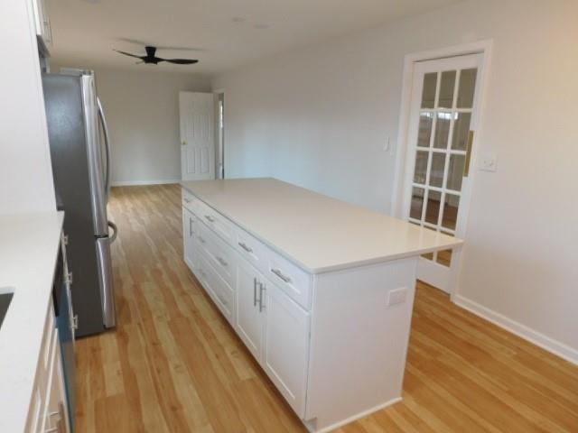 2407 Summerland Drive Decatur, GA 30032 - Photo 8 of 22 a view of a hallway with wooden floor