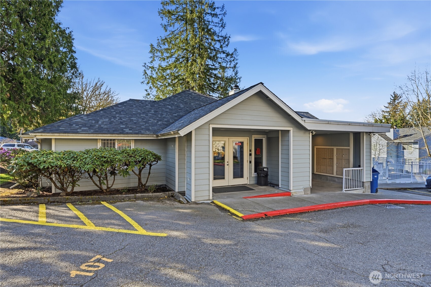 975 Aberdeen Avenue Northeast, Unit F308 Renton, WA 98056 - Photo 4 of 20 a house with trees in front of it