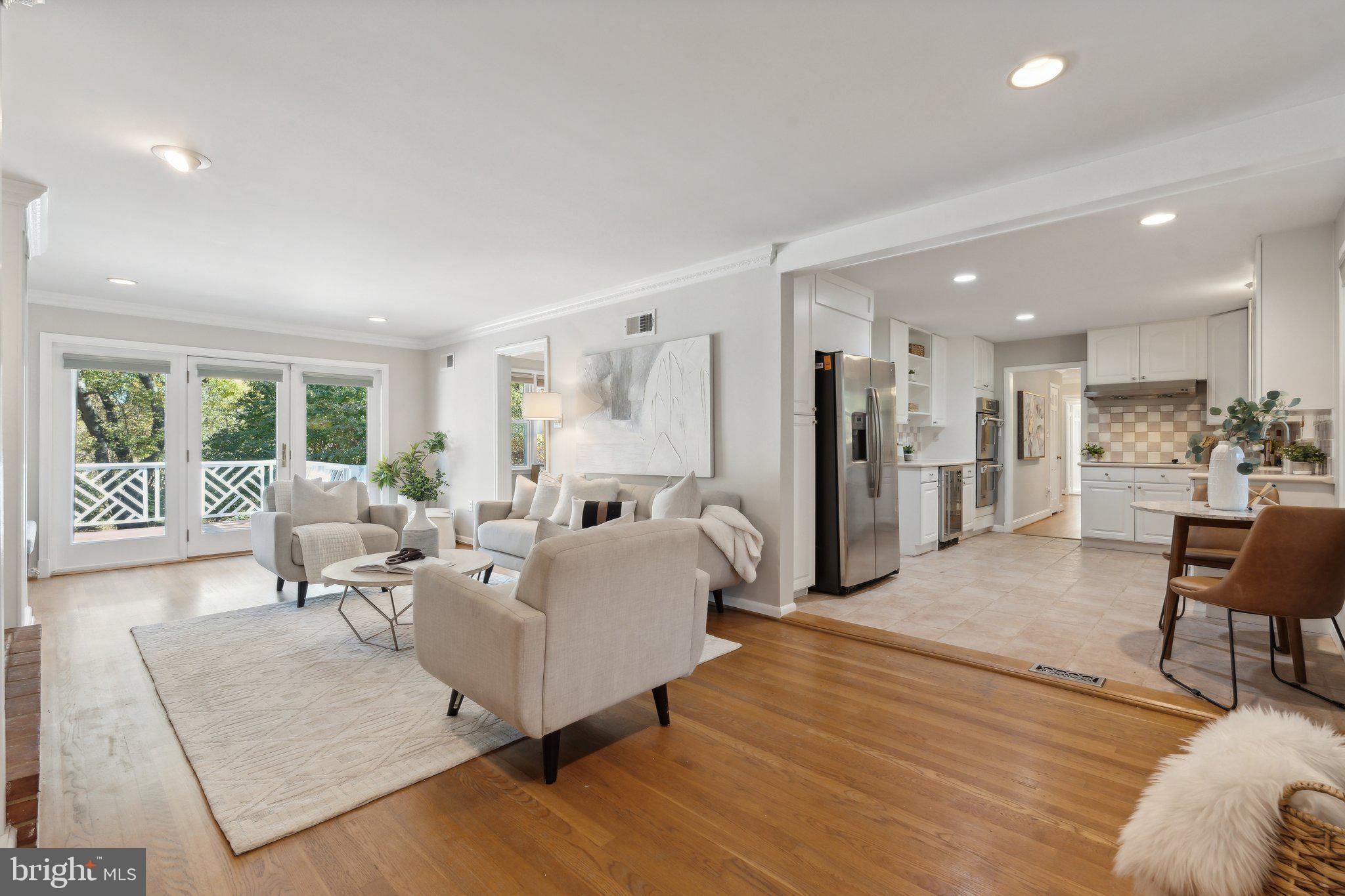 12727 River Road Potomac, MD 20854 - Photo 3 of 31 Living room/family open to Kitchen
