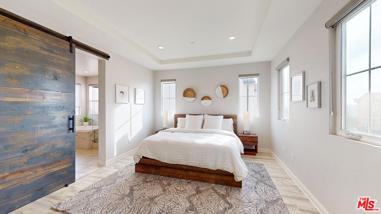 20607 West Chestnut Circle Porter Ranch, CA 91326 - Photo 18 of 52 a bedroom with a bed and a window