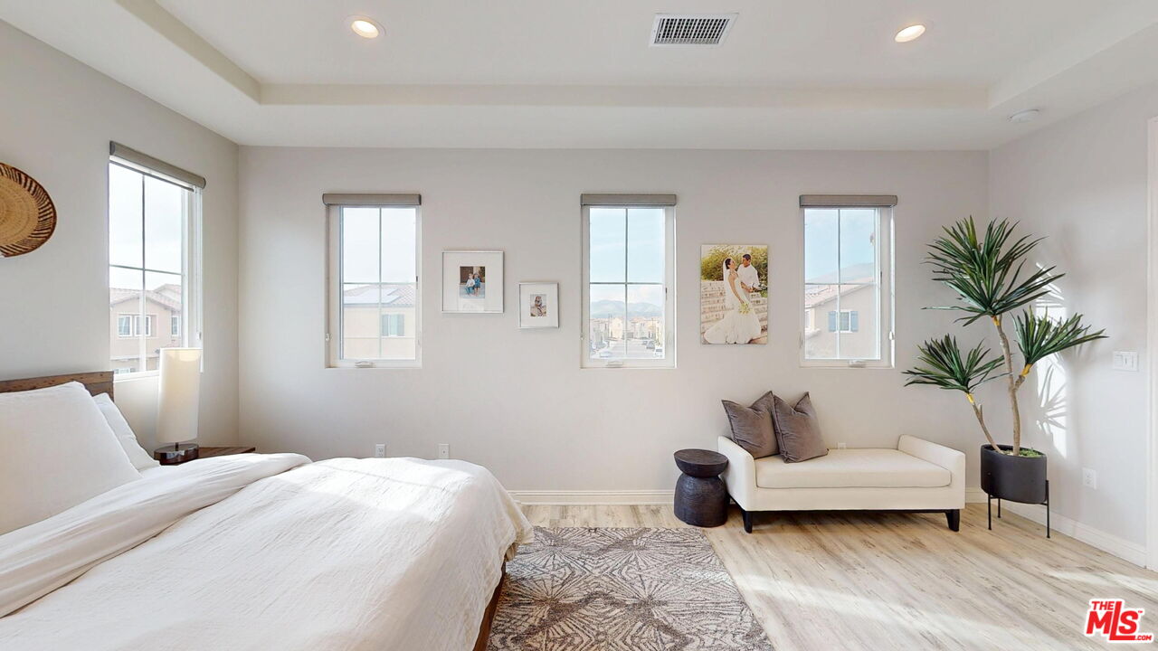 20607 West Chestnut Circle Porter Ranch, CA 91326 - Photo 19 of 52 a bedroom with a bed and a couch