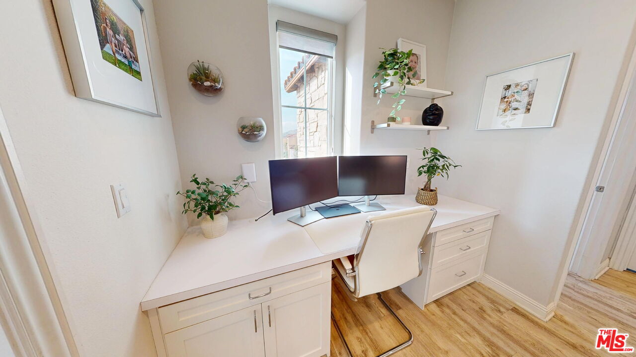 20607 West Chestnut Circle Porter Ranch, CA 91326 - Photo 22 of 52 a workspace with furniture and window