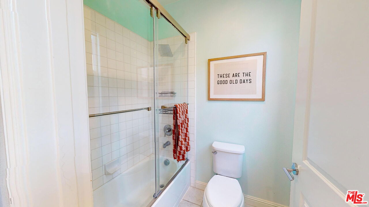 20607 West Chestnut Circle Porter Ranch, CA 91326 - Photo 27 of 52 a bathroom with a toilet and a shower