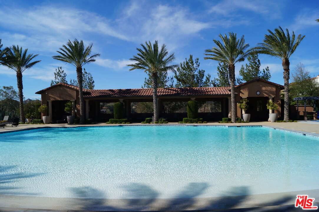 20607 West Chestnut Circle Porter Ranch, CA 91326 - Photo 36 of 52 a front view of house with yard and green space
