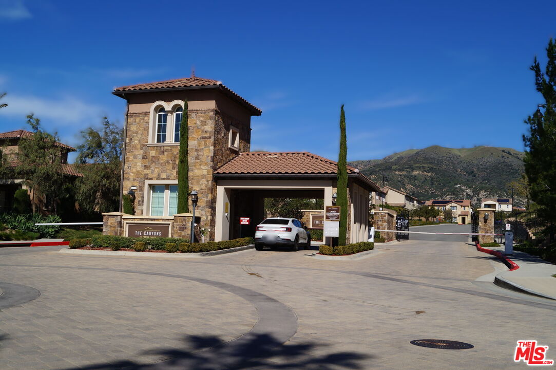 20607 West Chestnut Circle Porter Ranch, CA 91326 - Photo 49 of 52 a view of a street with cars on the road