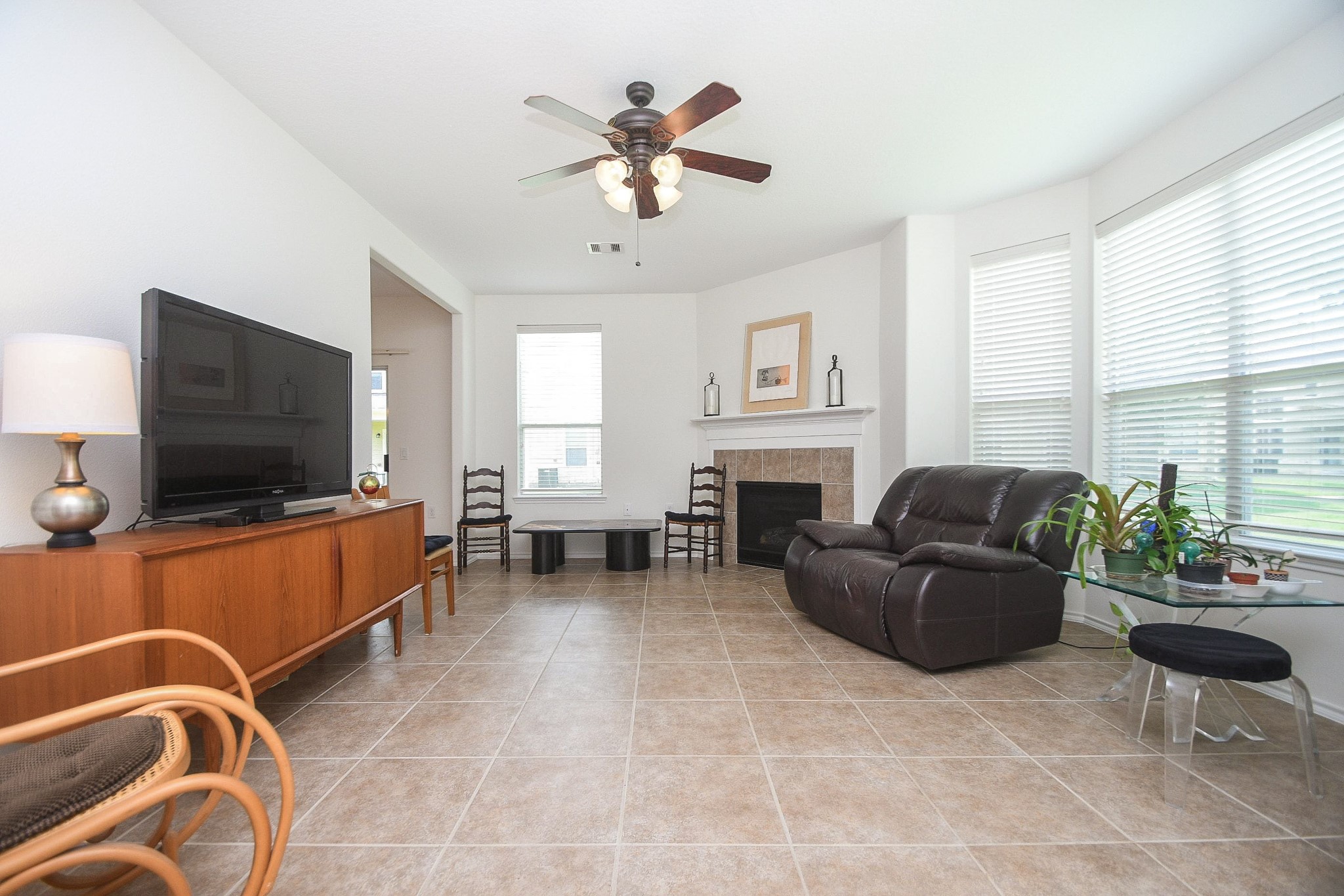 13600 Breton Ridge Street, Unit 36F Houston, TX 77070 - Photo 11 of 38 Bright and open living area filled with natural light.