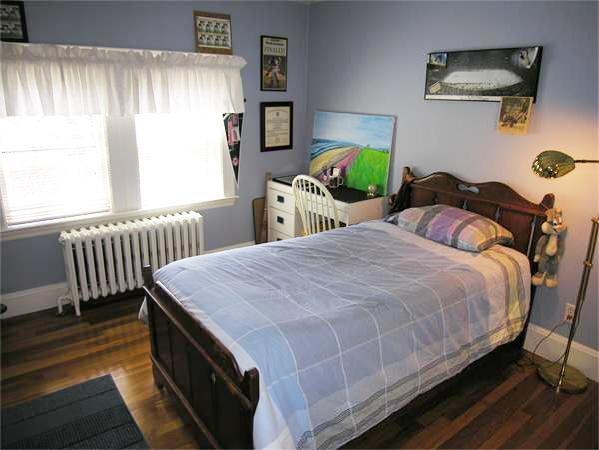 128 Hillcrest Road Needham, MA 02492 - Photo 16 of 28 a bedroom with a bed and a window