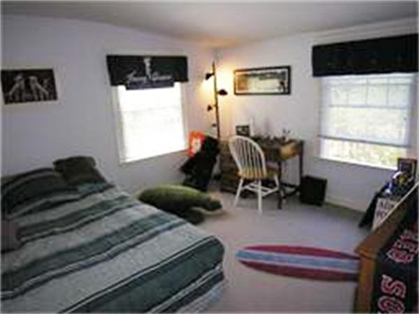 128 Hillcrest Road Needham, MA 02492 - Photo 17 of 28 a bedroom with furniture and a window
