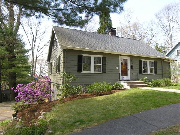 128 Hillcrest Road Needham, MA 02492 - Photo 2 of 28 a front view of a house with a garden and yard