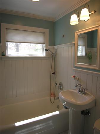 128 Hillcrest Road Needham, MA 02492 - Photo 23 of 28 a bathroom with a sink and a mirror
