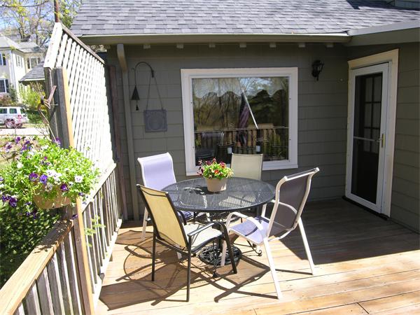 128 Hillcrest Road Needham, MA 02492 - Photo 25 of 28 a view of a table and chairs in patio of the house